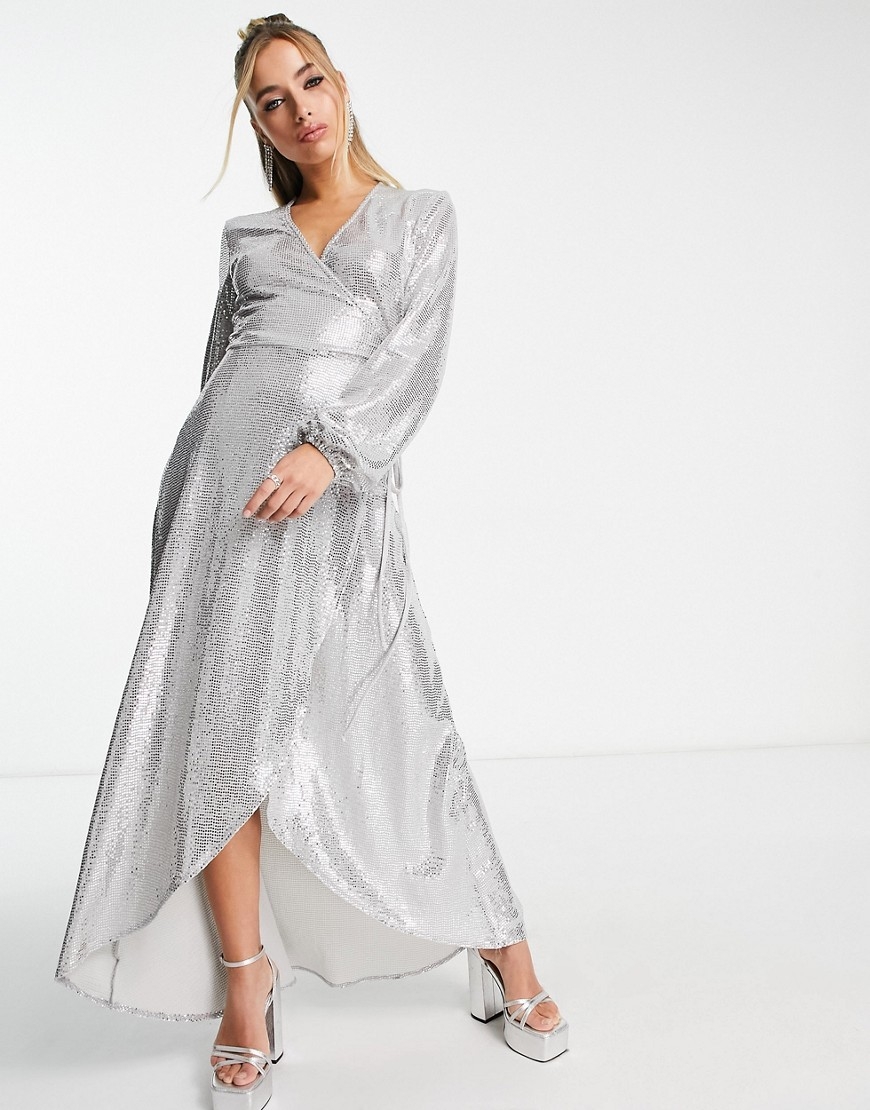 https://www.recommend.co/_next/image?url=https%3A%2F%2Fimages.asos-media.com%2Fproducts%2Fflounce-london-long-sleeve-wrap-maxi-dress-in-silver-metallic-sparkle%2F203763643-1-silversequin%3F%24XXL%24&w=3840&q=100