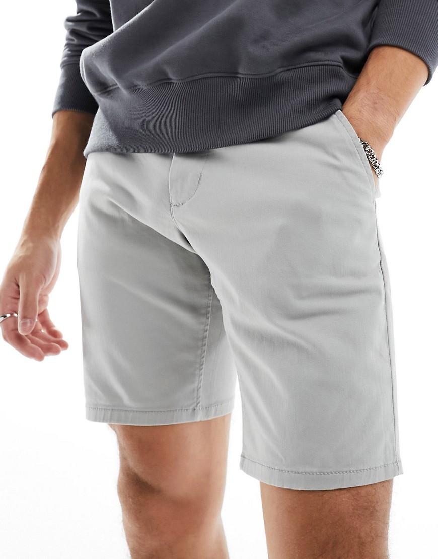 ASOS DESIGN slim chino shorts in shorter length with elastic waist in black